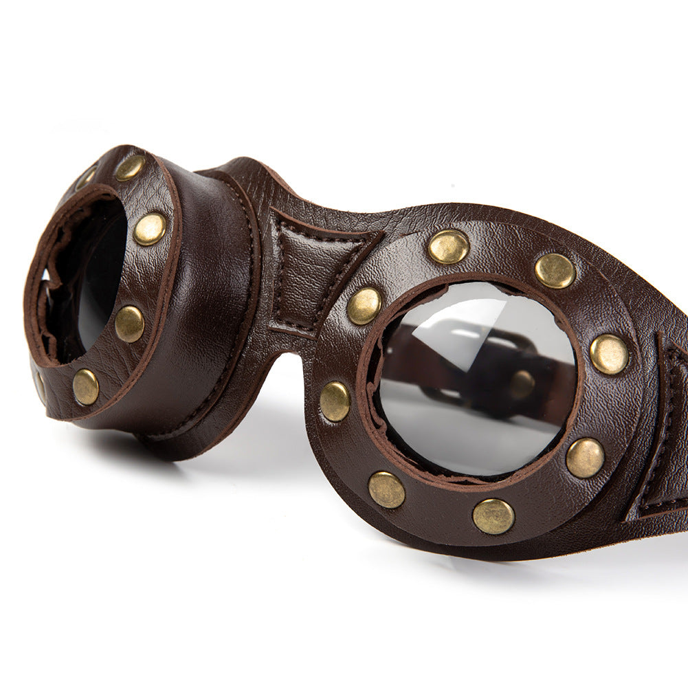 A pair of Steampunk Industrial Retro Goggles with brown leather straps made by Maramalive™.