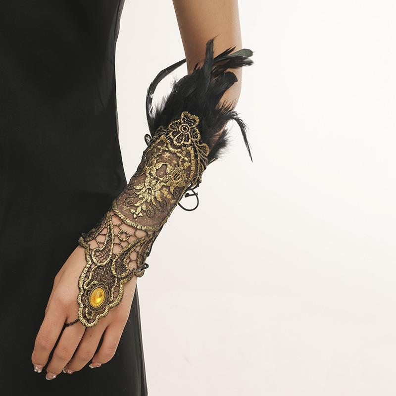 A woman wearing a black dress and a Maramalive™ Steampunk Retro Arm Chain.