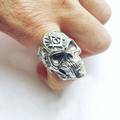 A Punk Personality Ring with a skull and a masonic symbol on it, made by Maramalive™.