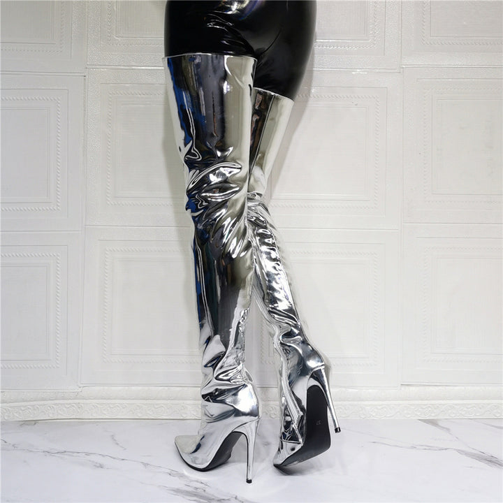 A woman donning fashionable silver Maramalive™ thigh-high boots made of artificial PU.