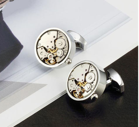 A pair of FUNCTIONAL STEAMPUNK CUFFLINKS with a watch mechanism by Maramalive™.