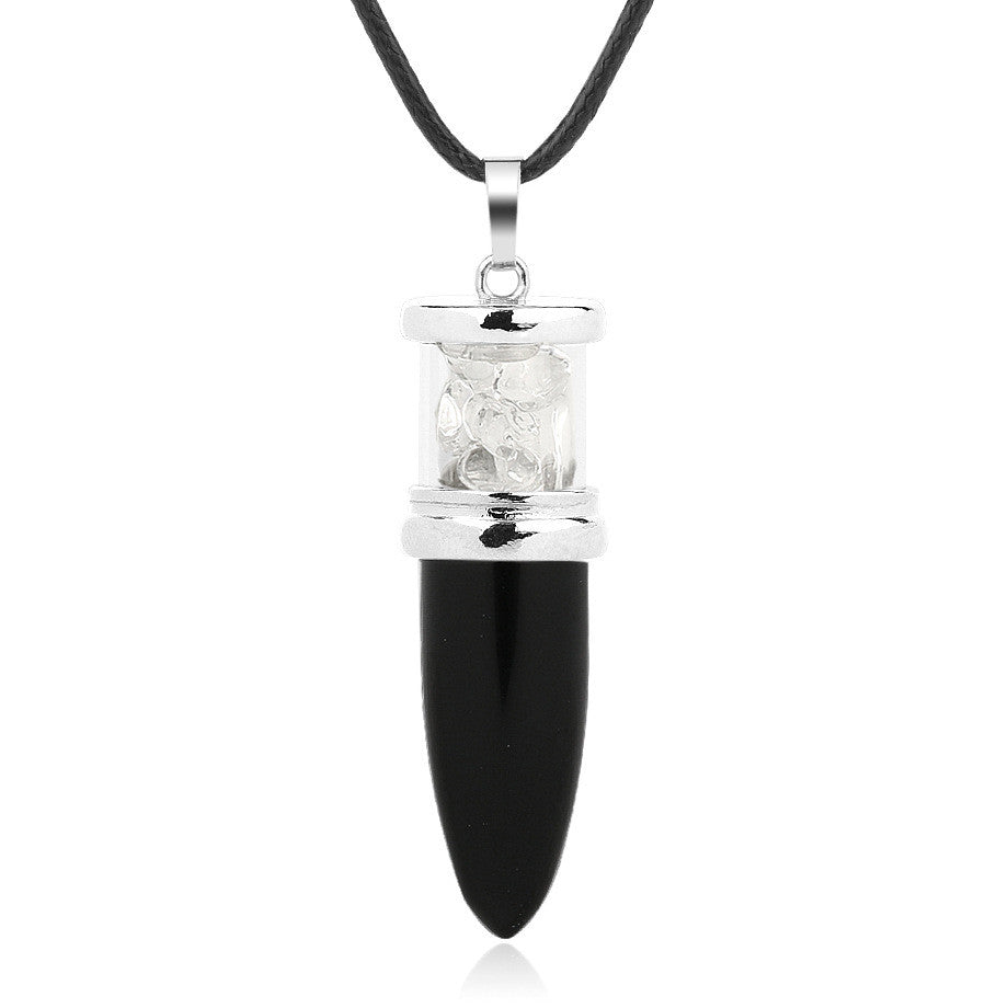 A Crystal Pendant with a white quartz stone on a black cord from Maramalive™.