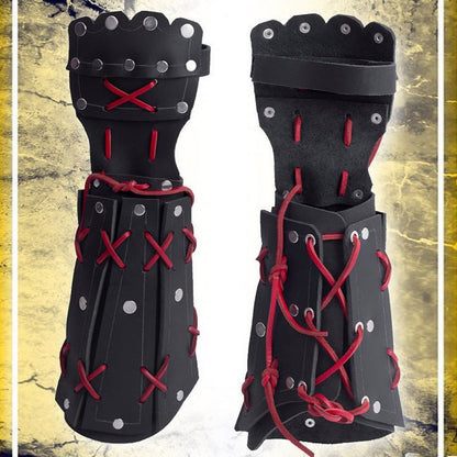 A person is holding a red and black Medieval Steampunk Men's Armguard Boxing Gloves by Maramalive™.