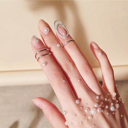 A woman's hand with the Trendy Personality Cold Nail Ring Line Feeling by Maramalive™ on it.