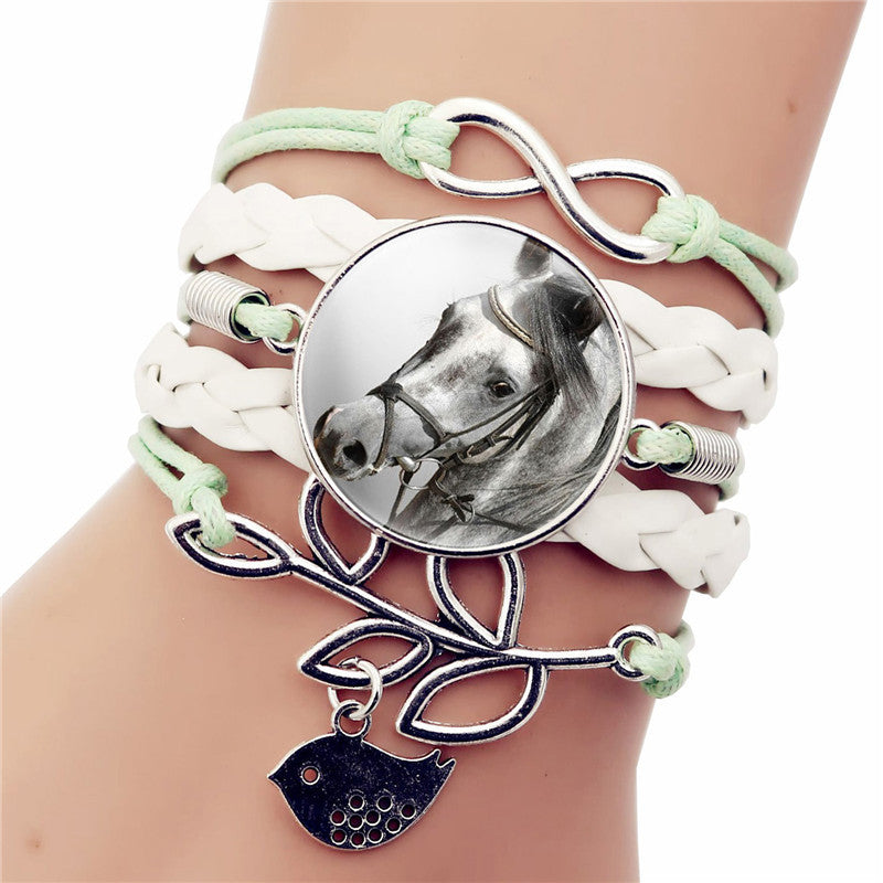 A Maramalive™ Black Horse Bracelet with an image of a horse on it.
