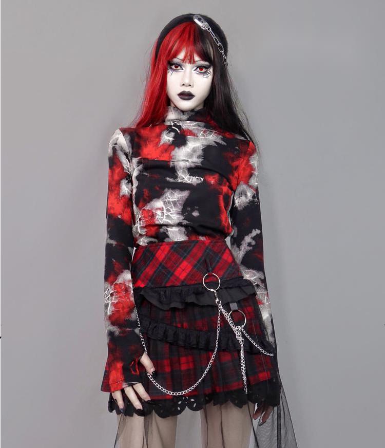 A Maramalive™ woman with black hair and a red and black plaid skirt. She also wore the Gothic Cobweb Long Sleeved Shirt - Punk Spider pattern Top.