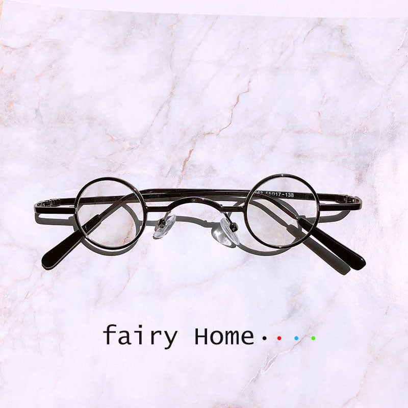A pair of Maramalive™ Steampunk Round Sunglasses Women Mirror Vintage with the words fairy home on it.