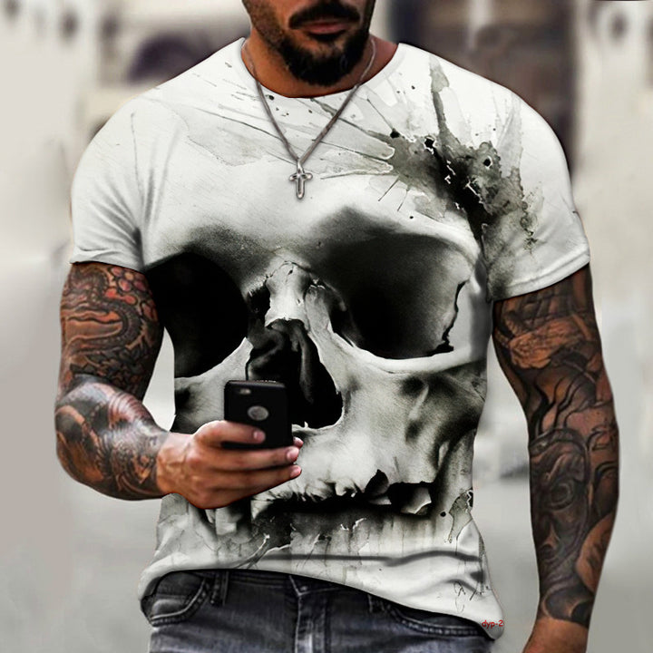 A bearded man with tattoos on both arms wears a Maramalive™ New Summer Horror Skull 3D Men's T-shirt. He is holding a smartphone and walking in an urban setting.