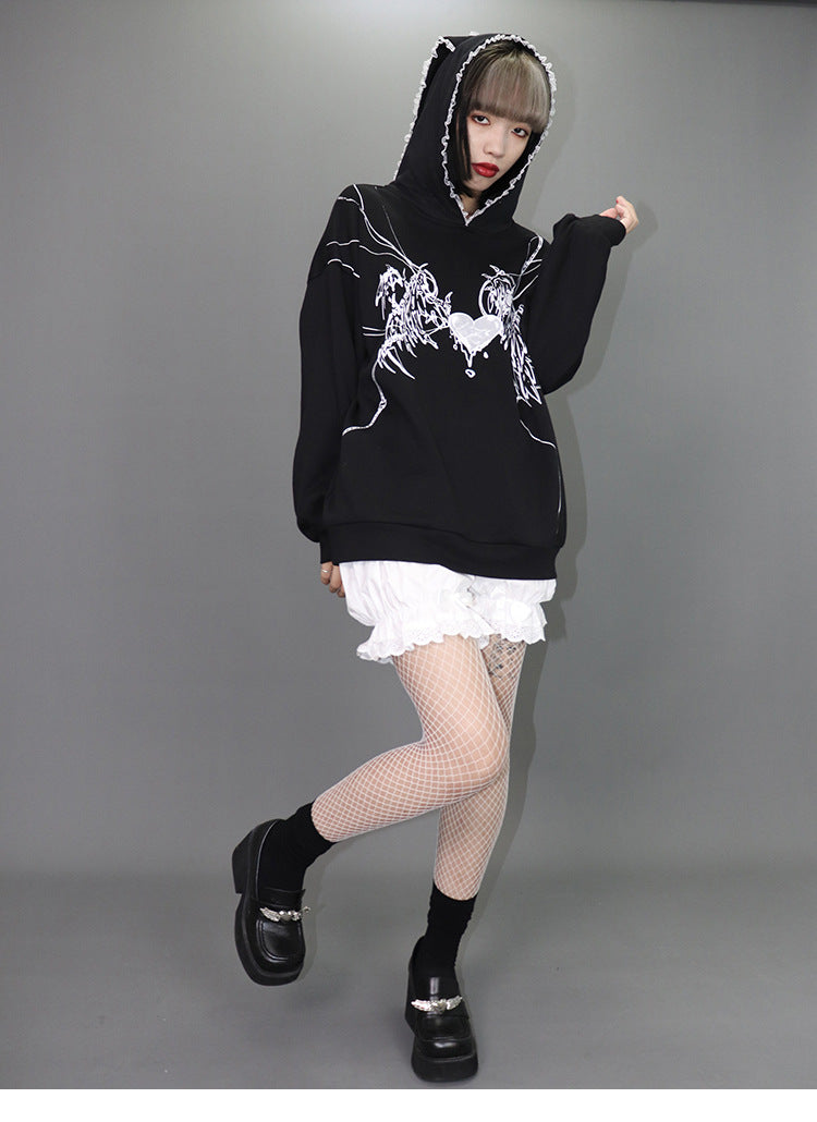 A gothic girl wearing a Maramalive™ Sports And Leisure Printing Street Hooded Top Gothic Sailor Moon Sweater.