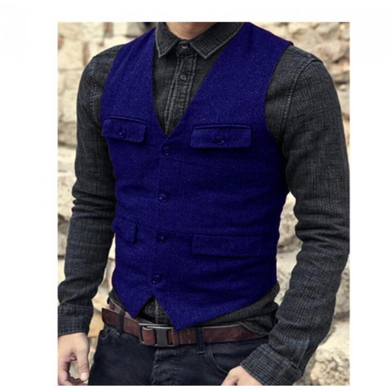 A person is wearing a dark gray button-up shirt with a Maramalive™ European And American Men's Vest Casual Solid Color Herringbone Vest and brown belt, showcasing a classic British style. The cotton blend fabric ensures comfort and durability. The image is cropped to show the torso and part of the arms.
