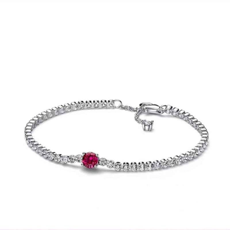 A Maramalive™ bracelet with a pink sapphire and diamonds.