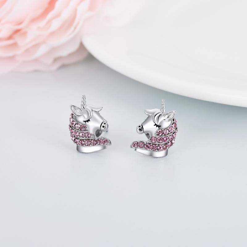 A pair of Maramalive's Sterling Silver Hypoallergenic Unicorn Stud Earrings Jewelry in pink crystal.