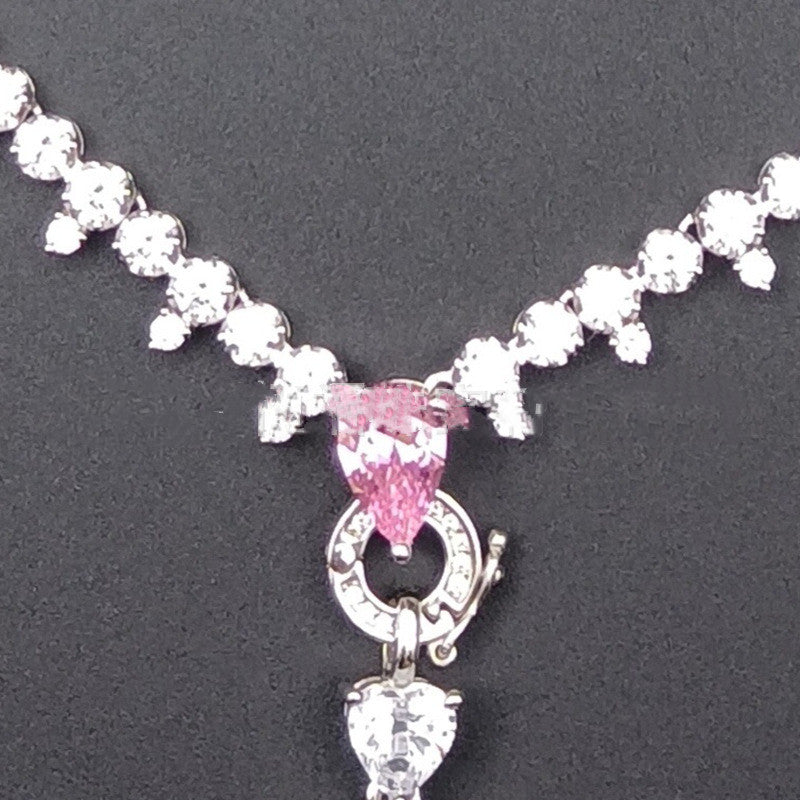 A Maramalive™ S925 Silver CZ Necklace for Women on a black background.
