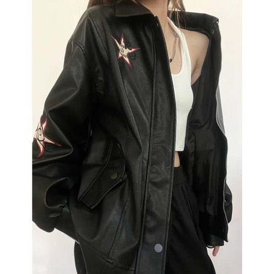 A woman donning a Vintage Embroidered Leather Coat adorned with stars, by Maramalive™.
