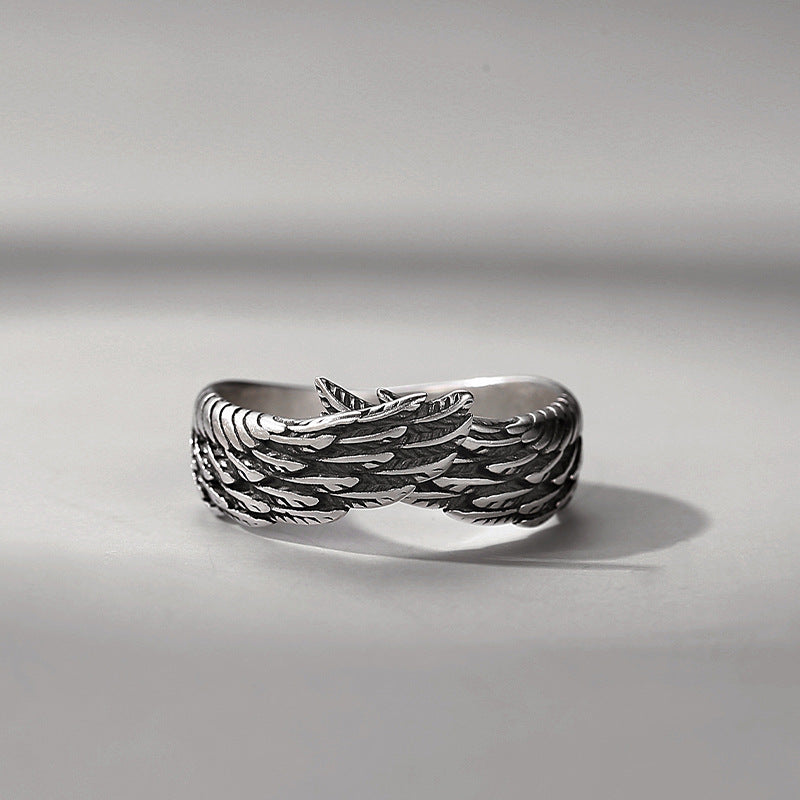 A Retro Angel Wings Ring with a pair of wings on it from Maramalive™.