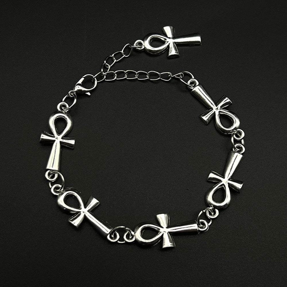 A Gothic Cross Bracelet Vampire featuring a Maramalive™ electroplated ankh alloy charm.
