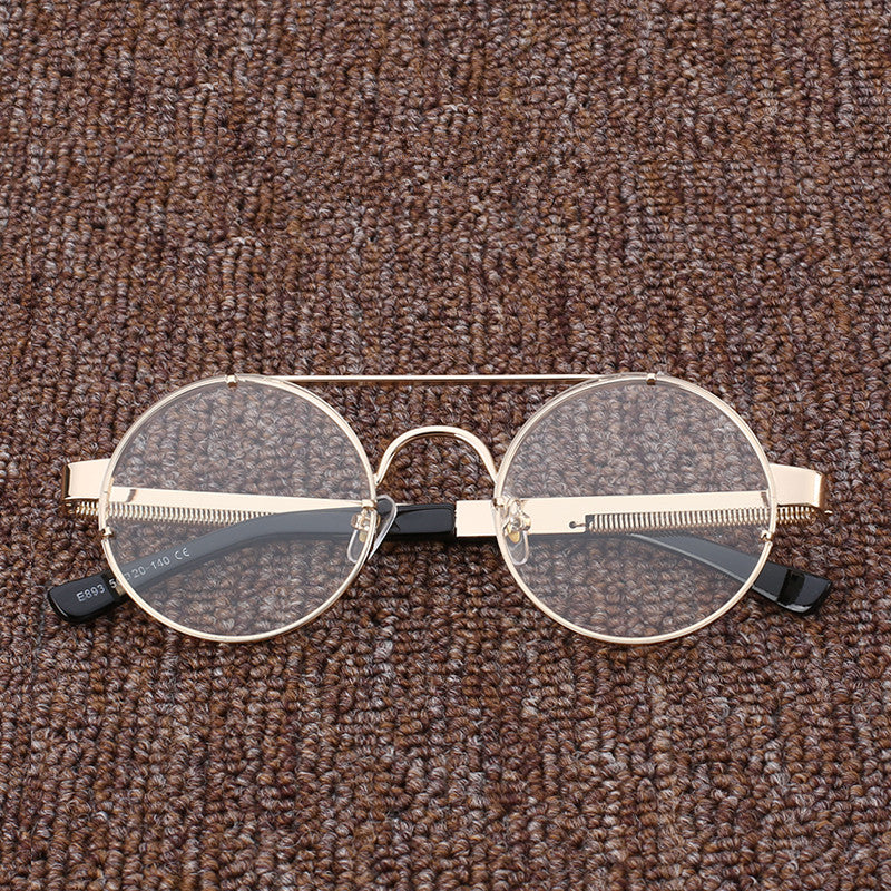 A pair of Steampunk retro glasses on a carpet. Brand: Maramalive™.