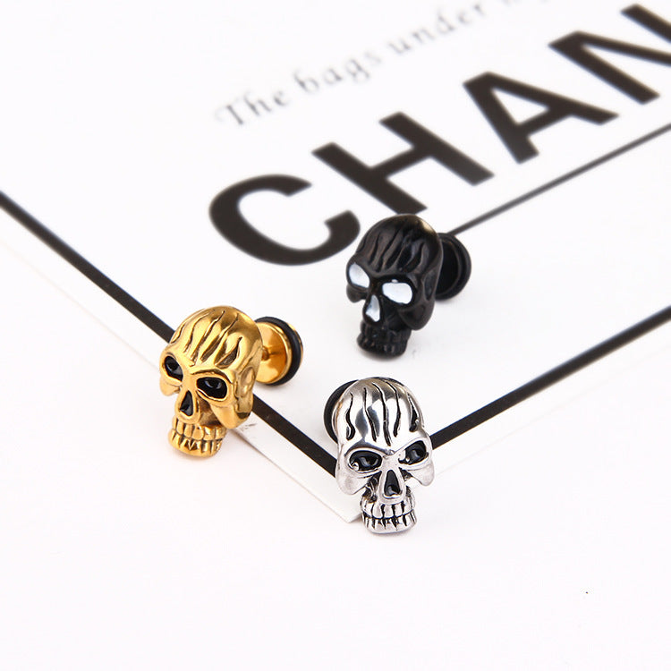 Three Maramalive™ vintage skull earrings with electroplating treatment in black, gold, and silver.