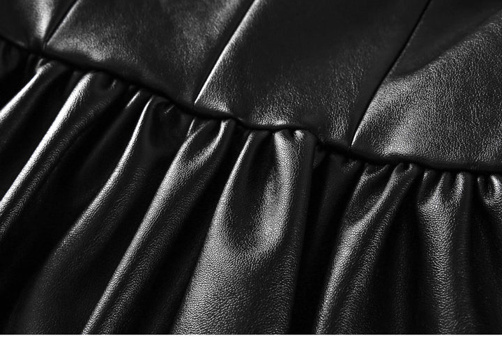 A solid color Leather Strap Skirt Dress with ruffles by Maramalive™.