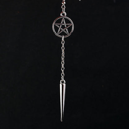 A woman wearing Gothic Pentagram Earrings by Maramalive™.