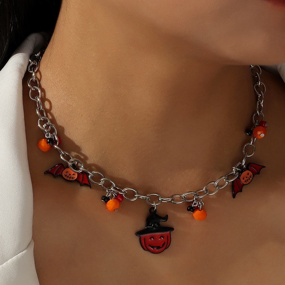 A woman is wearing a Maramalive™ Lips Pumpkin Halloween Necklace.