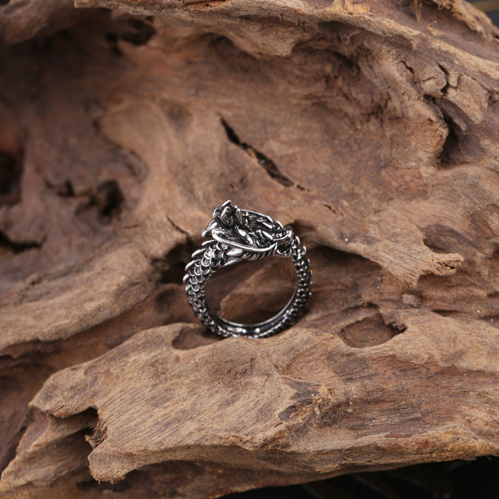 A black and white photo of a Maramalive™ silver Dragon Ring.