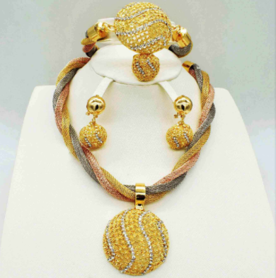 A Maramalive™ Fine Gold Jewelry Set with diamonds.