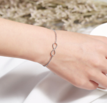 A Maramalive™ Infinity Jewelry Sets Necklace Earring Bracelet with an infinity symbol on it.