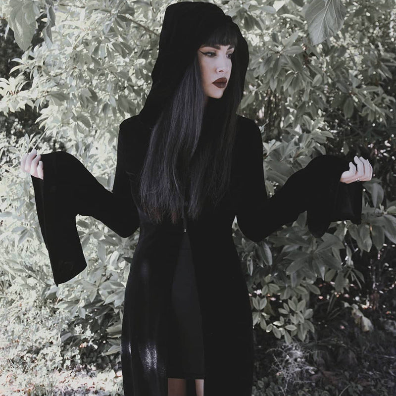 A girl in a Maramalive™ Dark Punk Halloween Velvet Cloak standing in the woods.