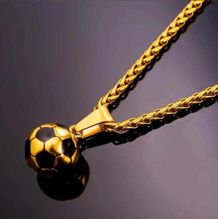 Two Stainless Steel World Cup Jewelry Pendant necklaces on a leather.