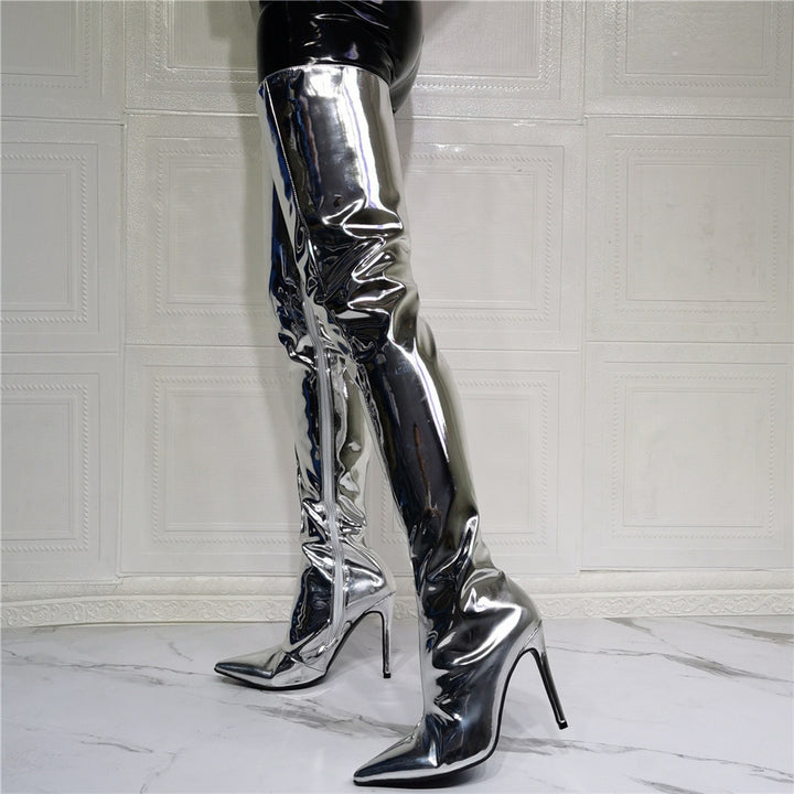 A woman donning fashionable silver Maramalive™ thigh-high boots made of artificial PU.