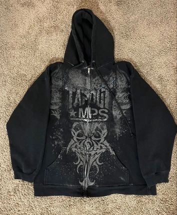 A black zip-up hoodie with the words "Maramalive™ Men's Skeleton Zipper Hooded Sweatshirt" in a distressed design on the front, laid flat on a beige carpet, resembling a punk rock sweatshirt.
