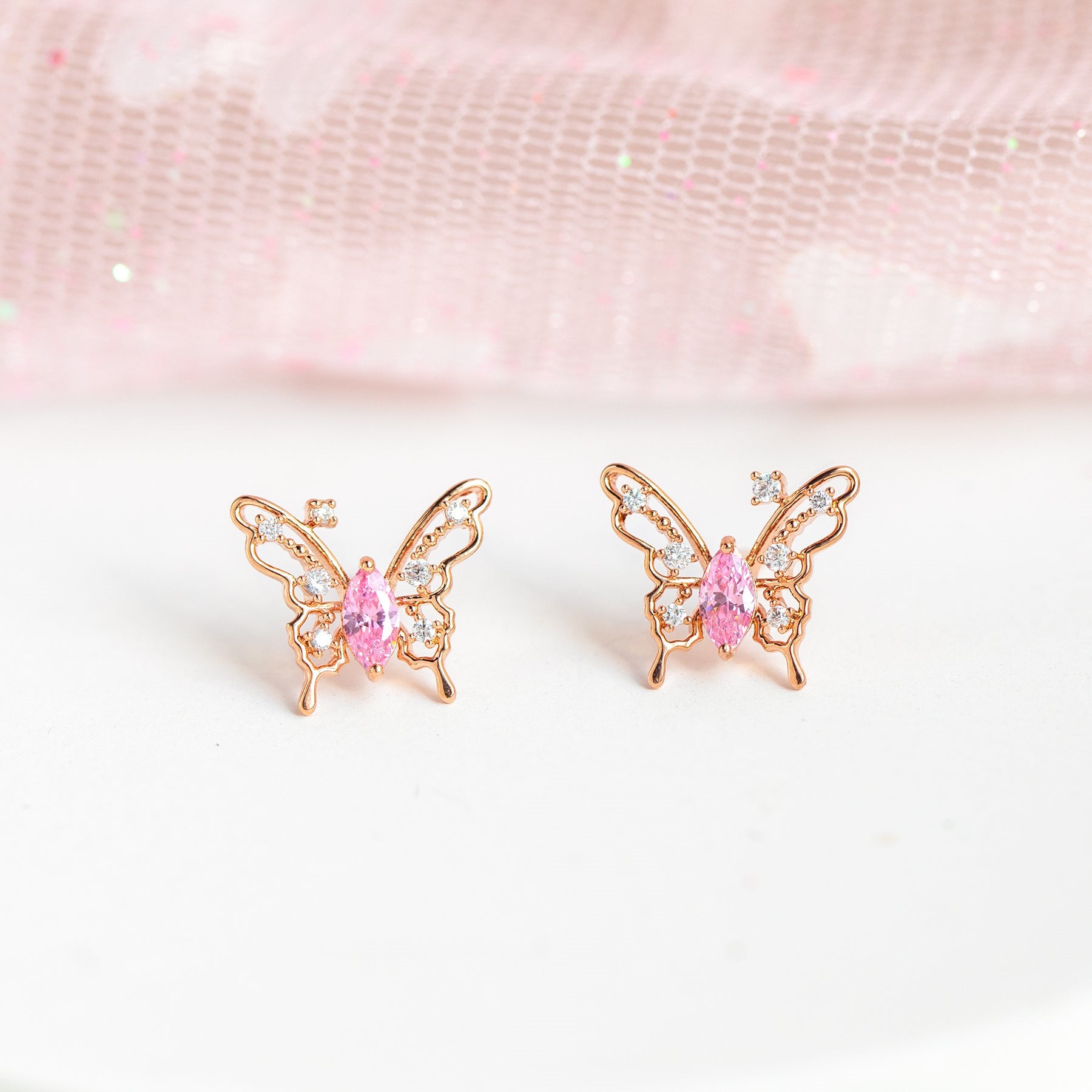 A pair of Micro Inlaid Zircon Silver Stud Earrings by Maramalive™ on a white background.