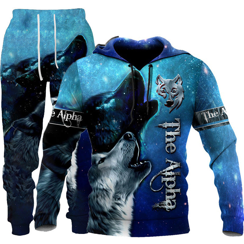 A blue and black Hooded Tracksuit with Three-dimensional Art by Maramalive™ featuring an image of a howling wolf, a smaller wolf head illustration, and the text "The Alpha.