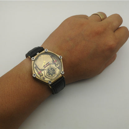A woman's wrist with a Steampunk Men's Pure Cowhide Belt Copper Watch from Maramalive™ on it.