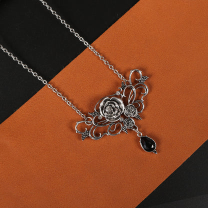Three Flower Pendant Necklaces Halloween Black by Maramalive™ with roses on them.
