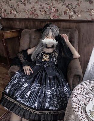 A girl is sitting in a chair holding a cup of tea with a Maramalive™ Revival Dress: Reborn in Style, featuring a Gothic lace and leather look.