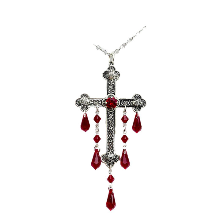 A hand is holding a Maramalive™ Large Cross Necklace Choke Gothic Pendant on a mannequin, exhibiting a dark style.