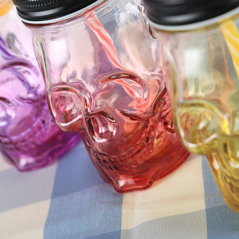 A set of colorful Skull Glass Mason Jars with straws and straws. Brand Name: Maramalive™
