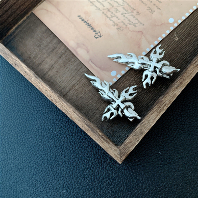 A pair of Gothic cross hairpin earrings in a wooden box, perfect for gifting from Maramalive™.
