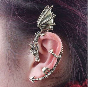 A close up of a person's ear with a Maramalive™ Dragon Ear Cuff.