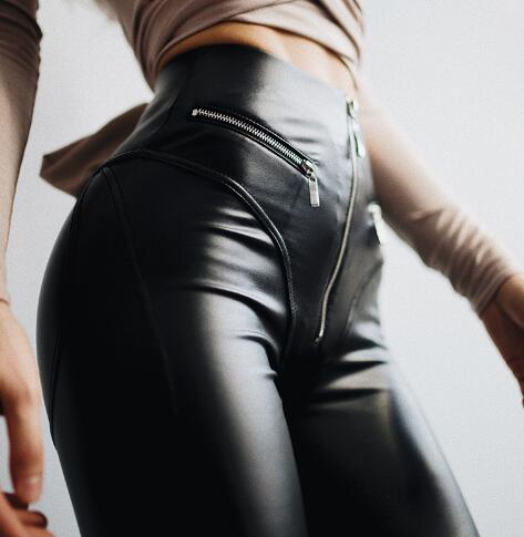 The back of a woman wearing Maramalive™ High Waist Gothic Black PU Leather Leggings Women Zipper Front Workout Jeggings in various sizes and colors.