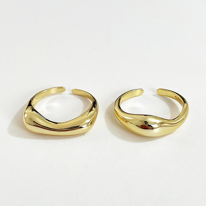 Two Maramalive™ French Minimalist rings on a white surface.