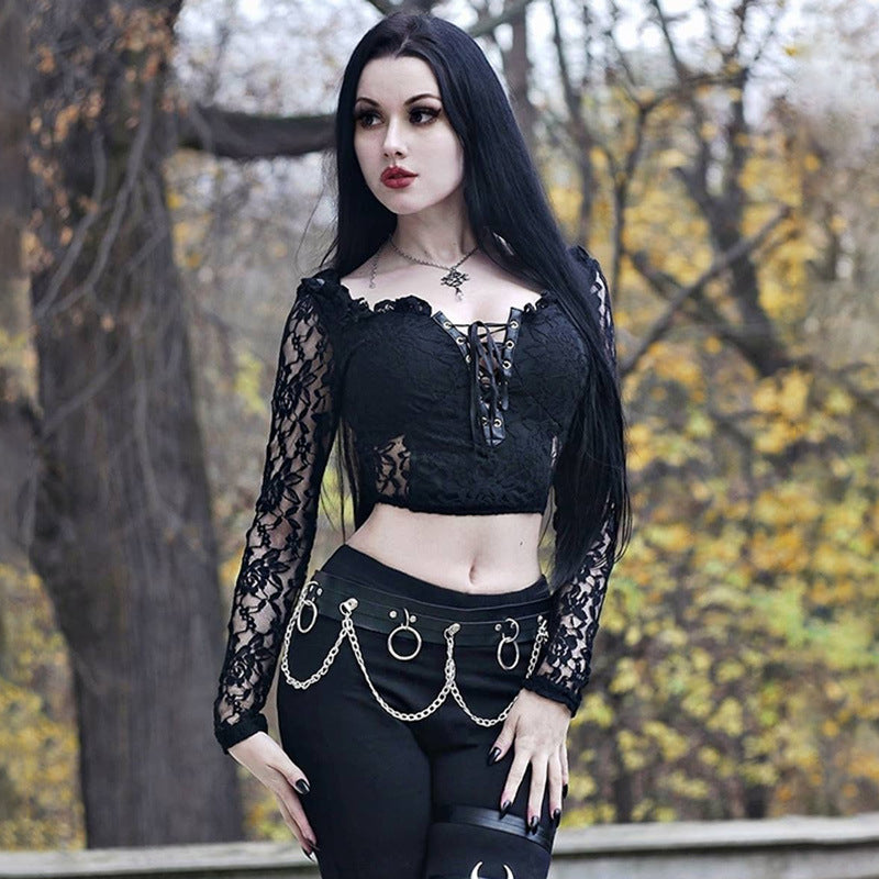 A Maramalive™ Gothic Lace Bandage Top Black Retro Sexy Perspective Long Sleeve T-Shirt-wearing woman posing for a photo with a street hipster vibe.