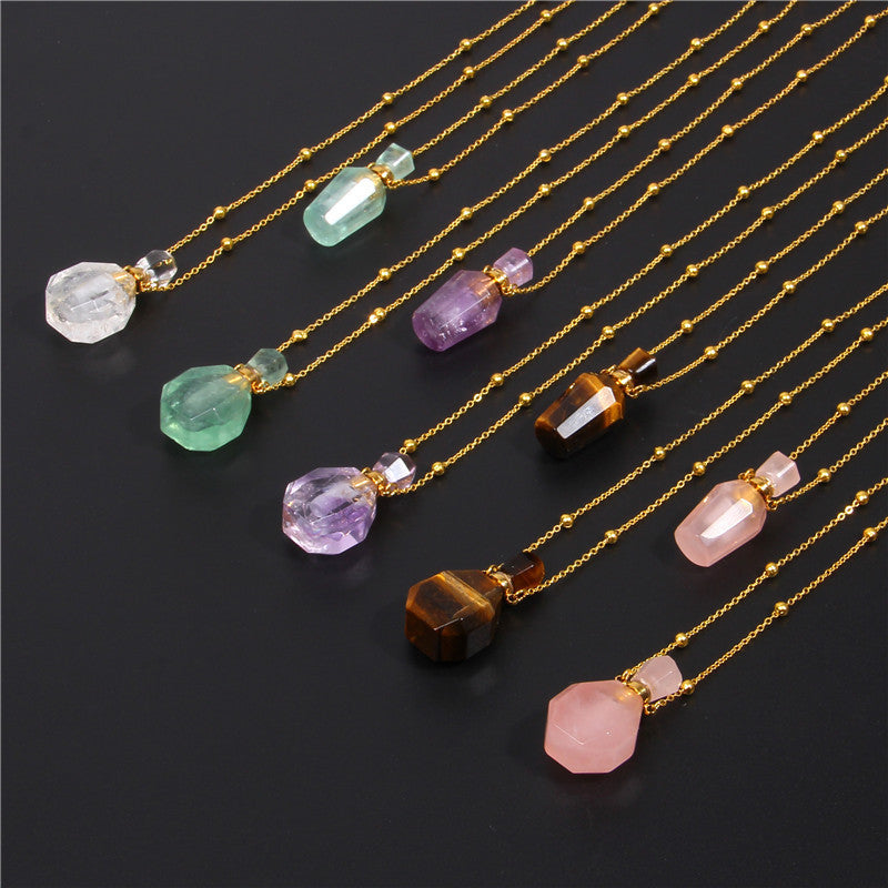 A set of Maramalive™ Crystal Perfume Pendant Necklaces with different colored stones.
