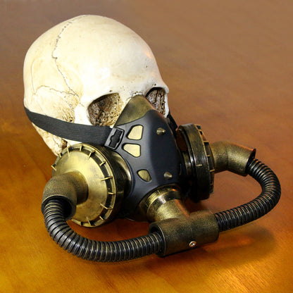 A Maramalive™ Steampunk Halloween Masquerade Mask with a gas mask on a wooden table.