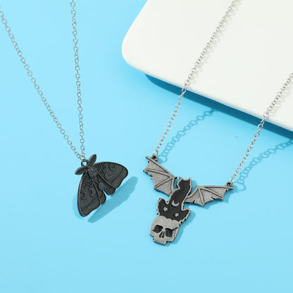 Two Halloween Dark Butterfly Skull necklaces from Maramalive™.