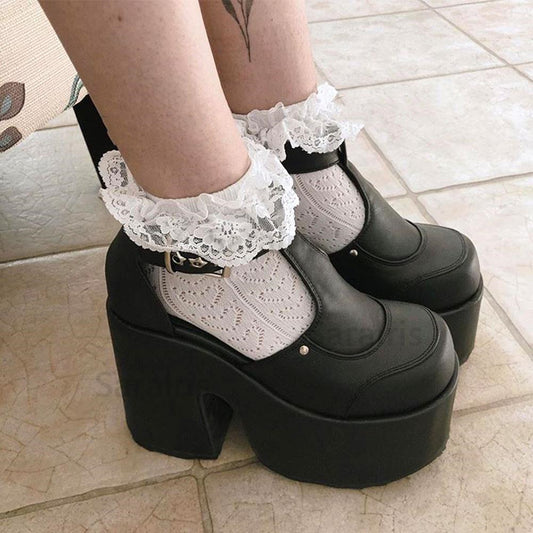 A woman wearing Maramalive™'s Brand New Big Size Platform Gothic Style Women's Boots with lace socks.