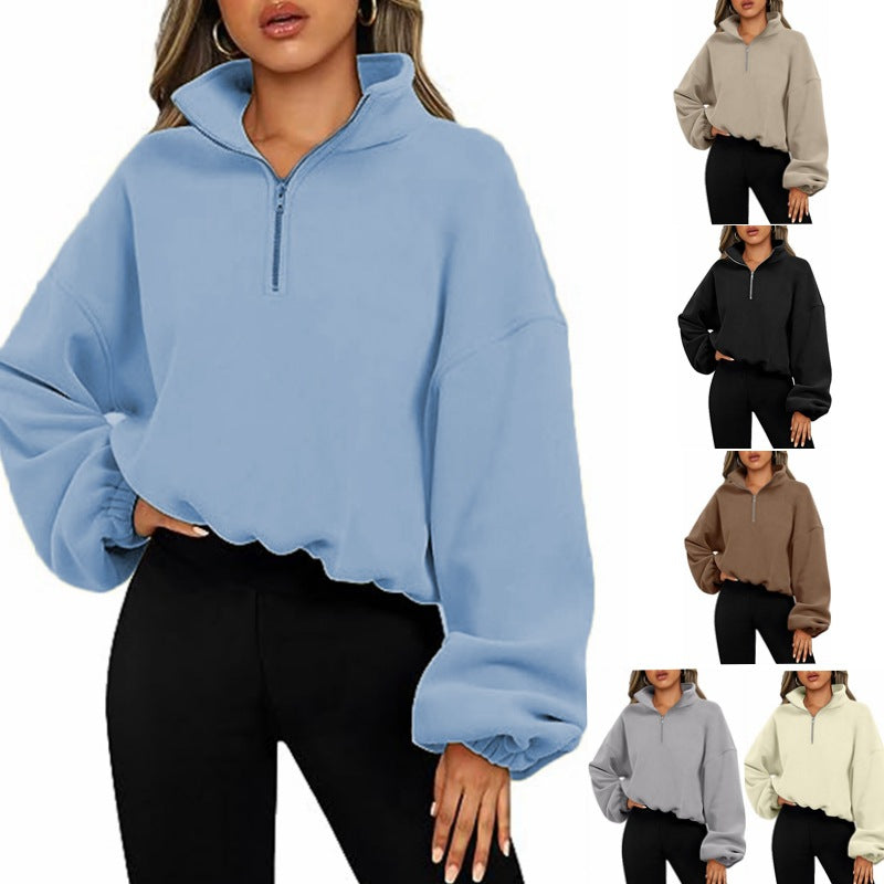 A person models a light blue, oversized Loose Sport Pullover Hoodie Women Winter Solid Color Zipper Stand Collar Sweatshirt Thick Warm Clothing from Maramalive™, paired with black pants. On the right, the same fashionable and simple pullover is shown in five additional solid colors: gray, black, brown, beige, and cream.
