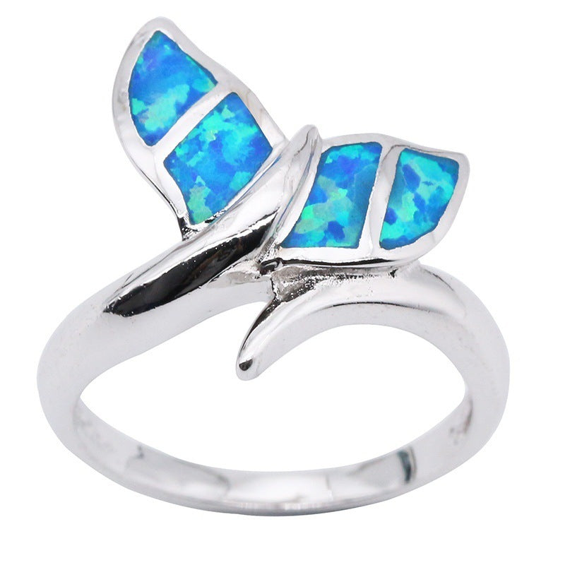 A Maramalive™ Opal Mermaid Tail Ring with a blue opal butterfly.